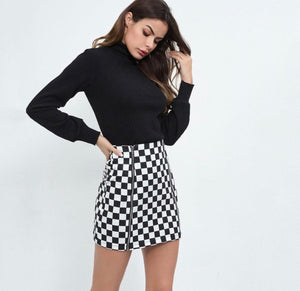 Black and white zipper mini skirt.
